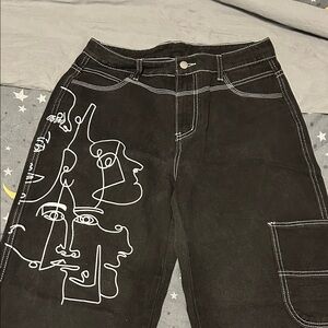 Black Jeans with White Abstract Face Design
